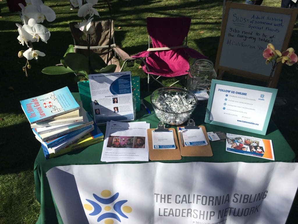 California Siblings Women's March display table