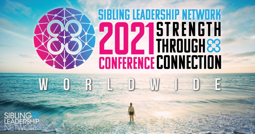 A woman standing on a beach in front of the conference logo and text reading, "Worldwide"