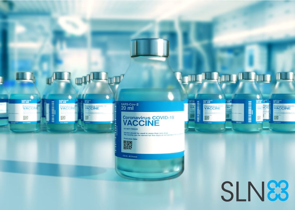 Image of vaccine bottles all lined up