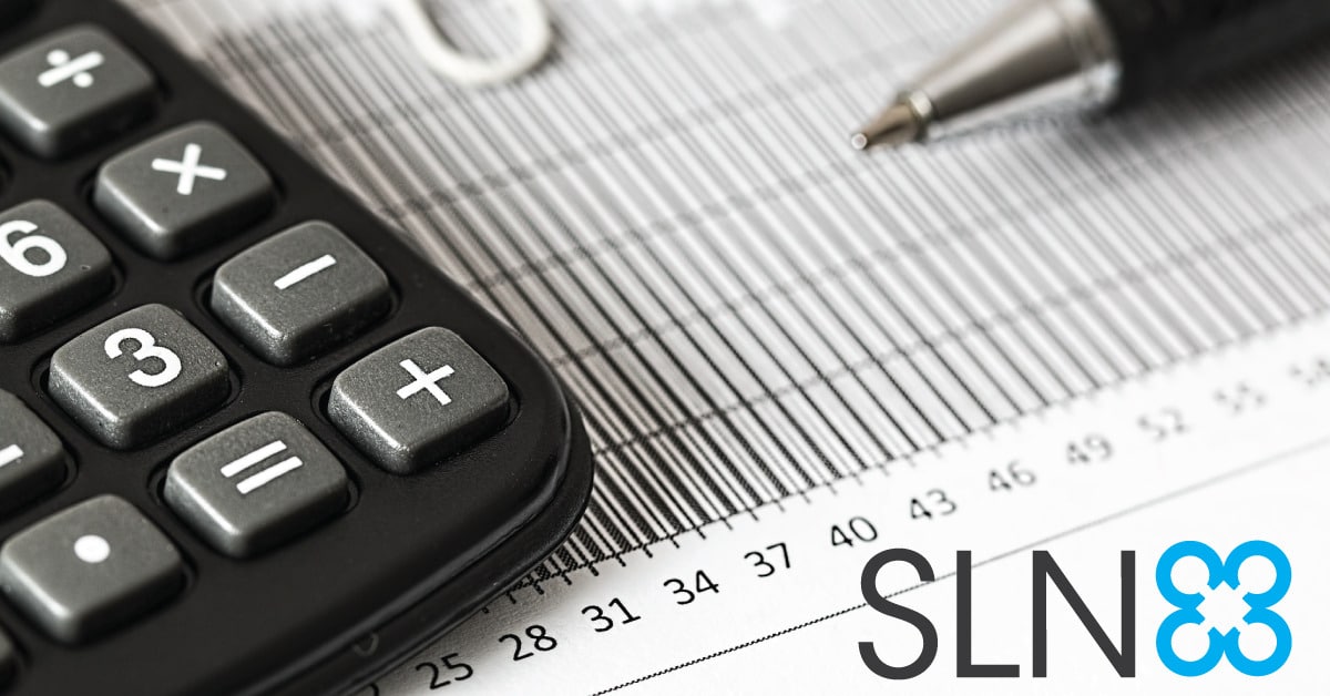 tax papers and calculator on desk